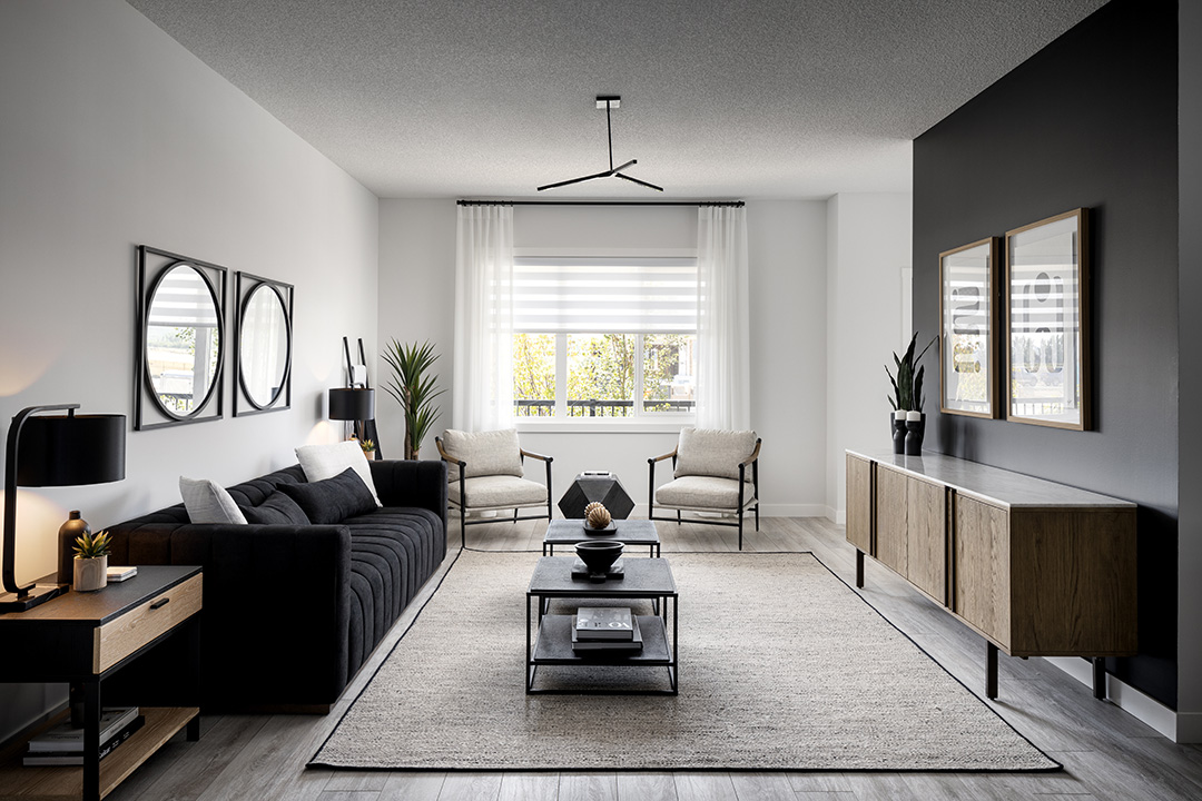 a living room with a couch, chair, table and a tv