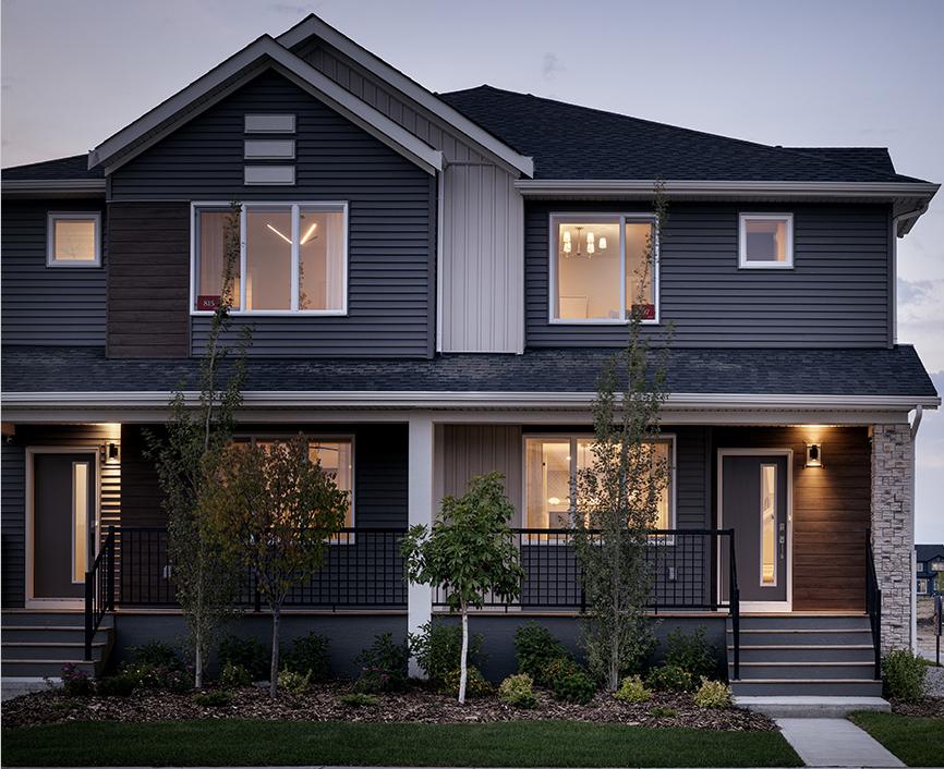 a house with a large window and a large house