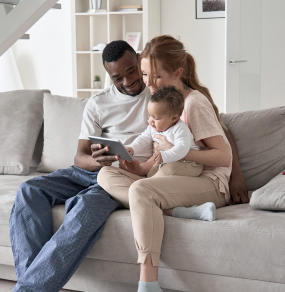 a man and a woman are sitting on a couch