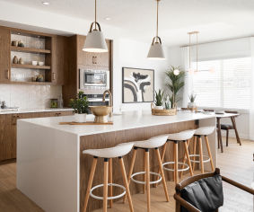 a kitchen with a sink, stove, and a counter top