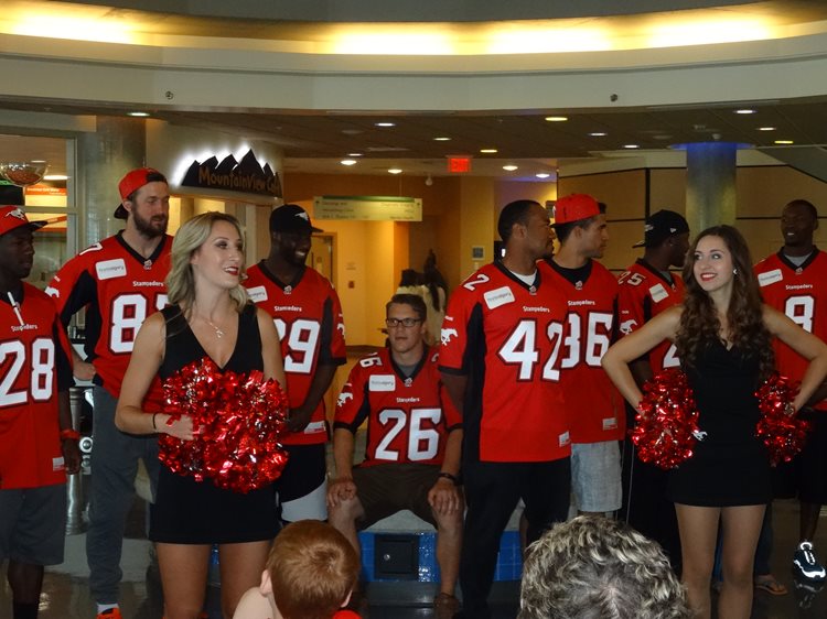 a large group of people dressed in red and white