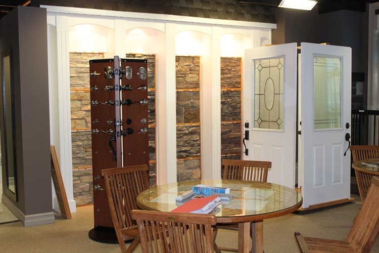 a dining room table with a wooden table and chairs