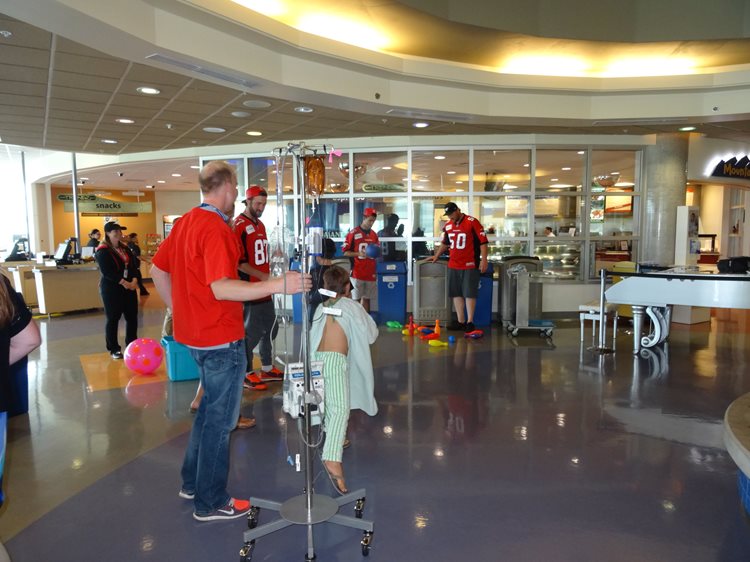 a child bowling in a hospital