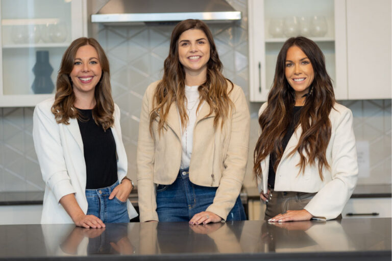 three female in suit