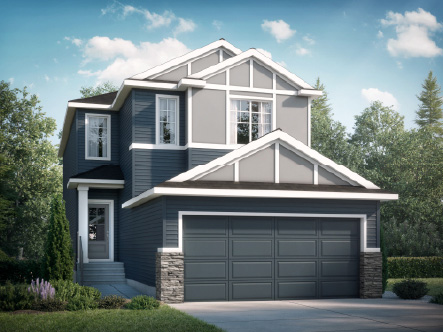 Two-storey front drive home with an attached double garage lit at dusk