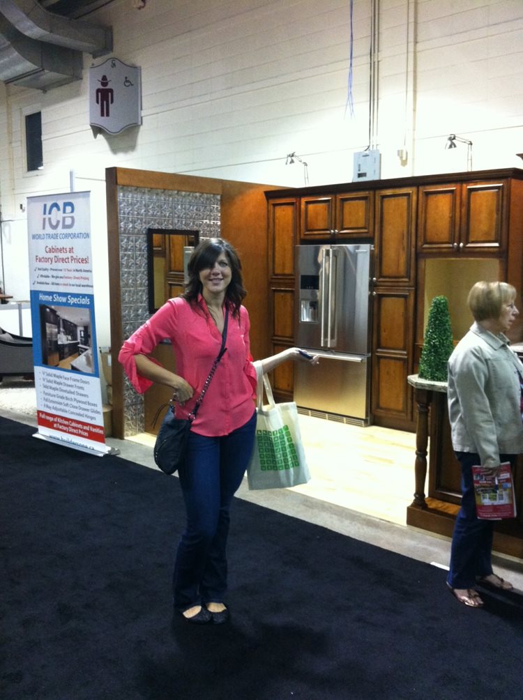 a woman standing in a store with a frisbee