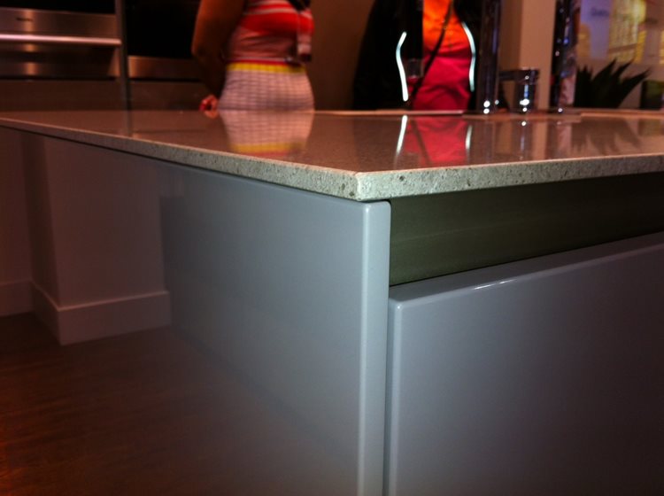 a kitchen counter with a sink and a counter top