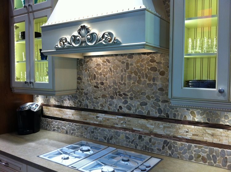 a kitchen with a sink and a stove