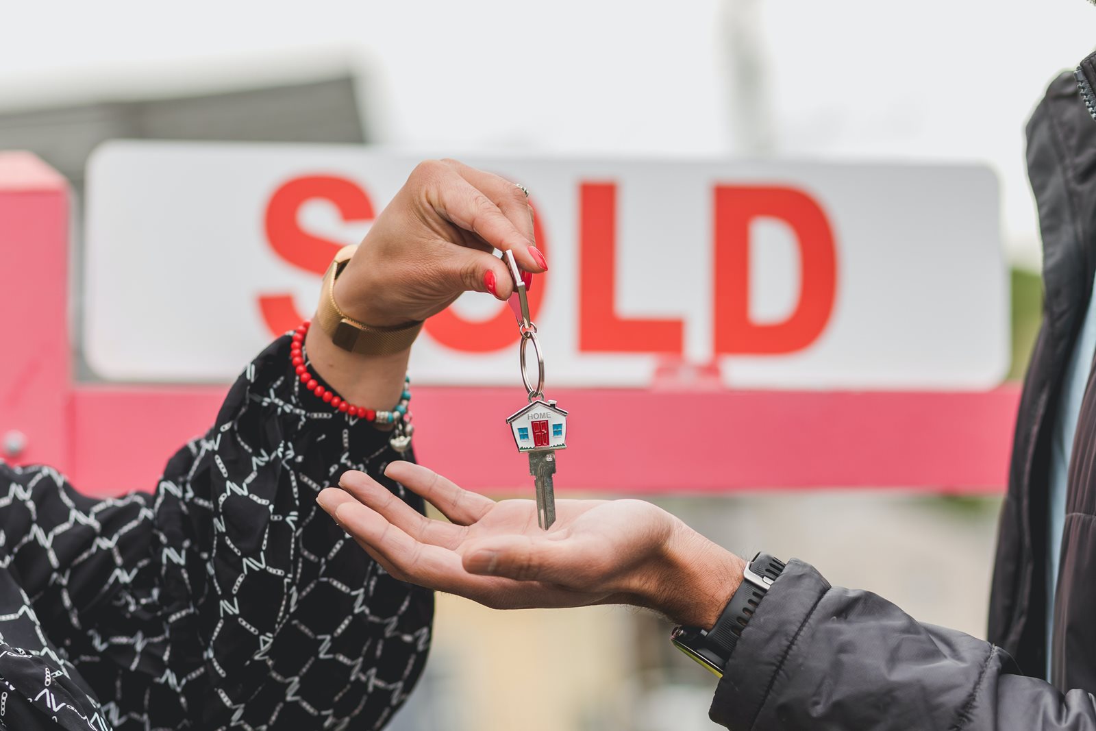 Keys being handed to new homeowners. 